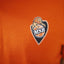 POLO MANCHES COURTES ORANGE